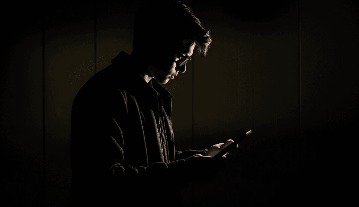 Michael Carter in a dark background